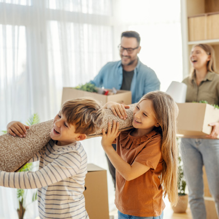 family unpacking in a home